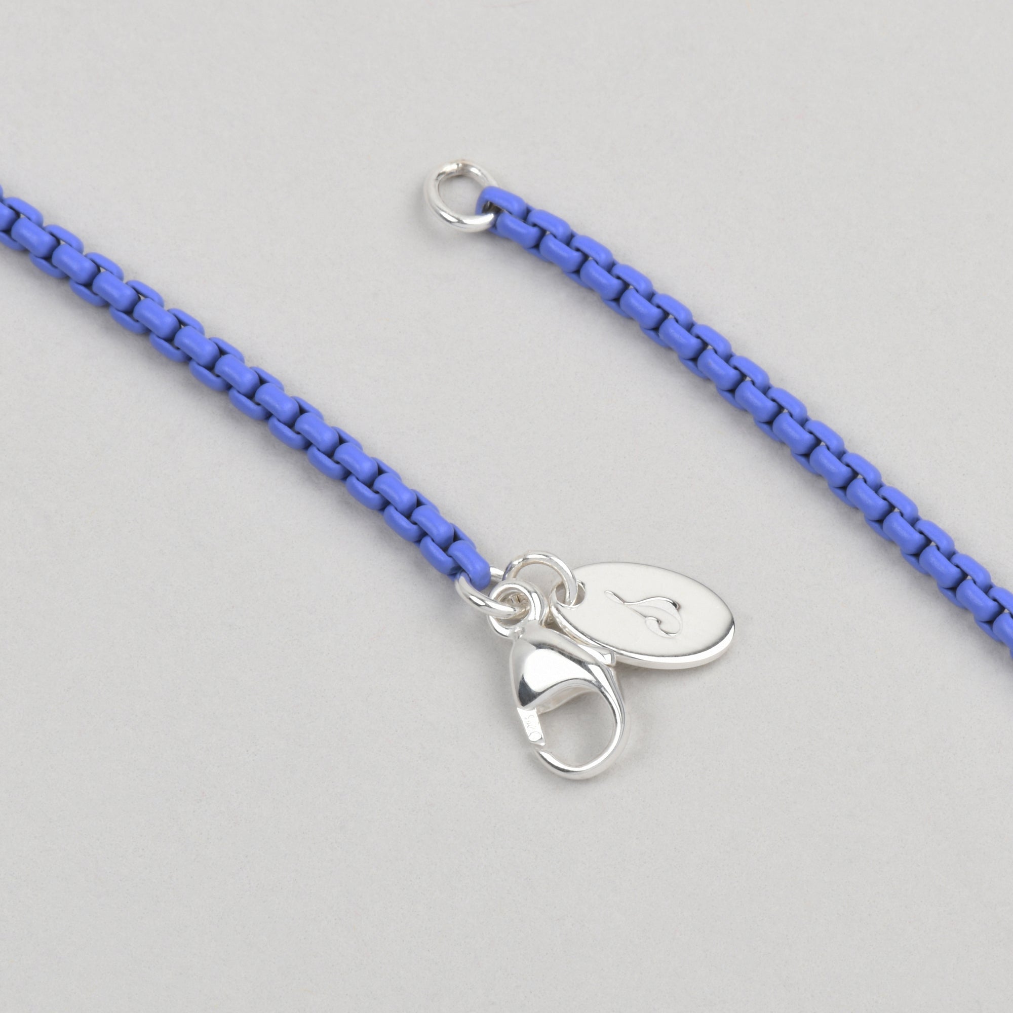 high quality sterling silver lobster clasp on a purple box chain