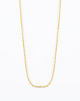 bevel cut cable chain in 14k solid gold on white background