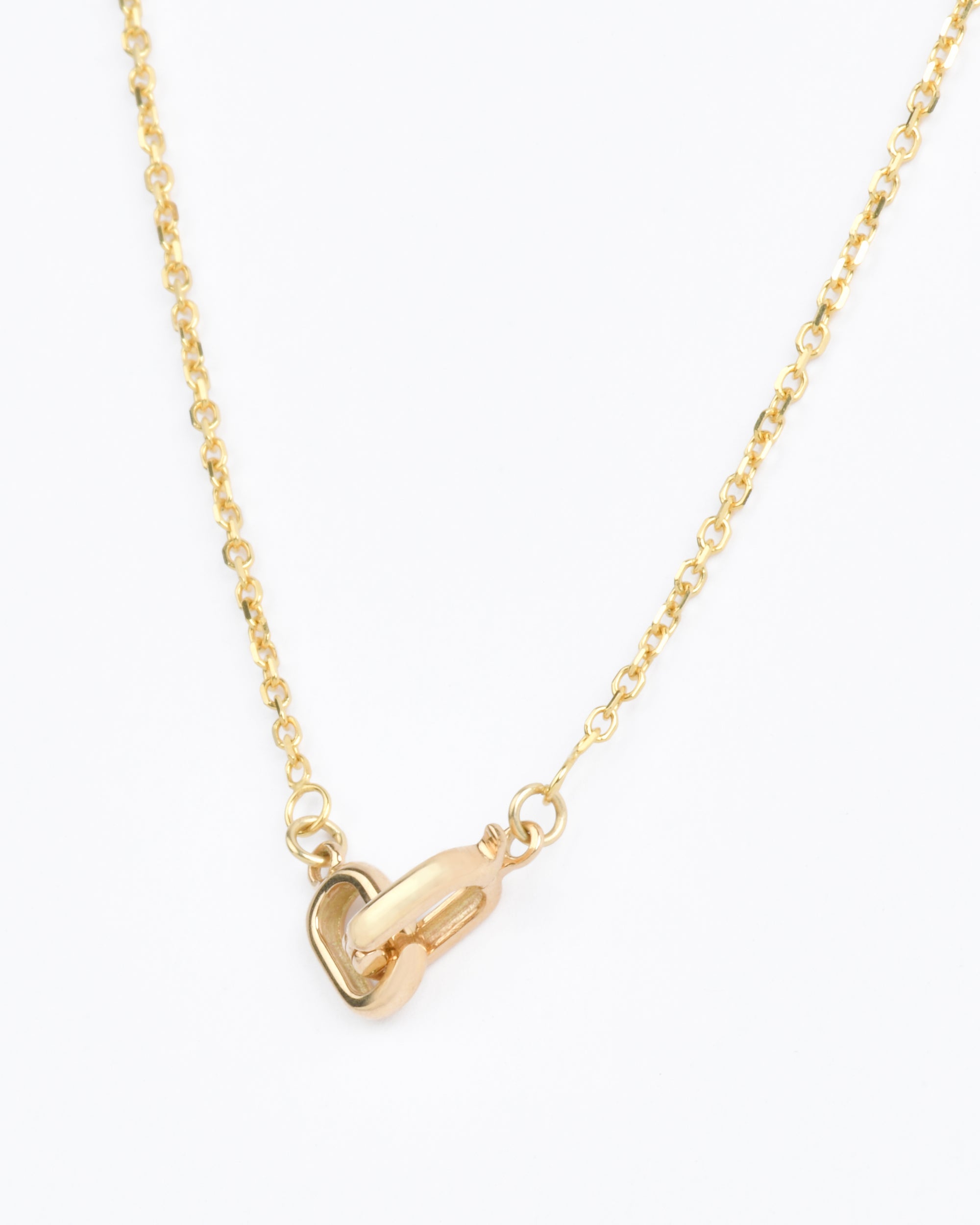 14k gold bevel cut cable chain with a unique interlocking clasp in a shape like the cassiopeia constellation