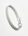 Sterling silver bracelet with a mesh style chain featuring a circular hinge clasp, by Sincerely Chain Co.