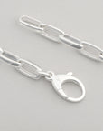 Sterling Silver Chain necklace highlighting the Lobster Clasp and soft rounded paperclip links by Sincerely Chain Co.