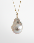 Baroque Pearl on a 14k gold satellite chain, fine jewelry by Sincerely Chain Co.