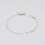 Sterling Silver bracelet on grey background