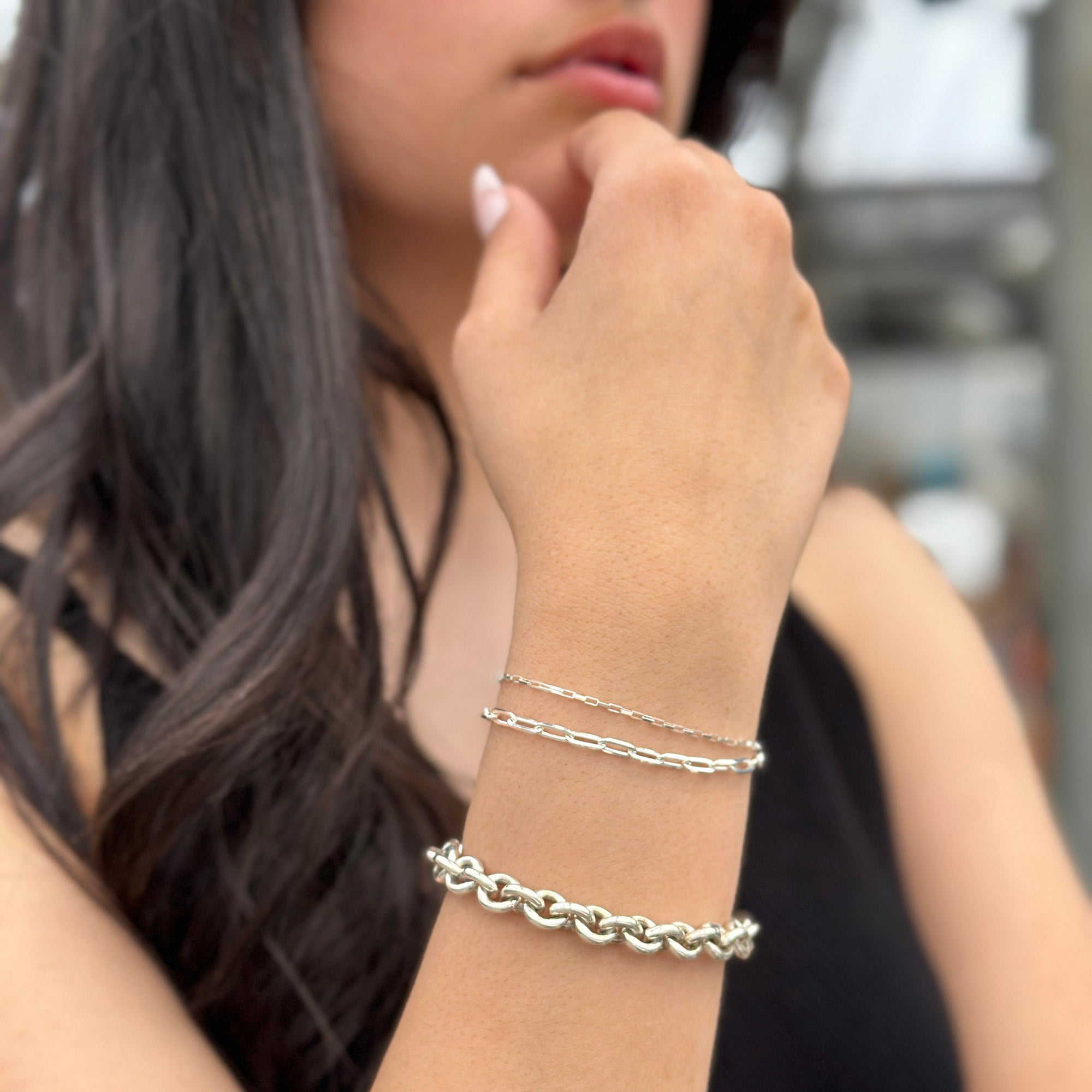 women wearing large round links sterling silver bracelet