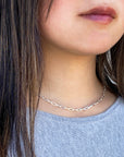 women wearing sparkling sterling silver necklace