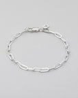 sturdy 9 mm links sterling silver bracelet on grey background