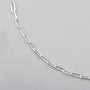 close up of sterling silver chain with diamond cut  paperclip links