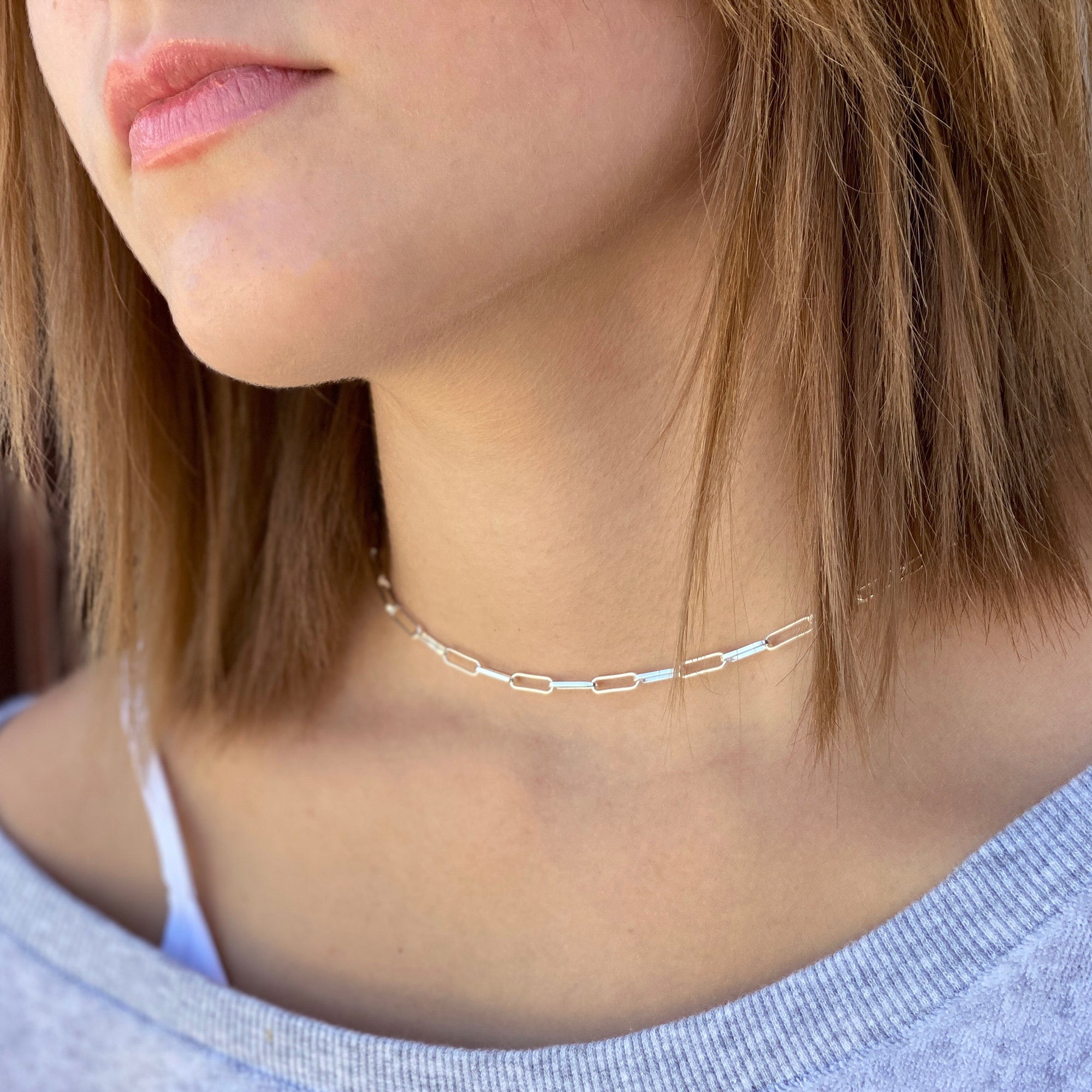 women wearing sterling silver choker necklace