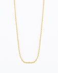 bevel cut cable chain in 14k solid gold on white background