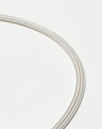 Sterling silver bracelet with a mesh style chain featuring a circular hinge clasp, by Sincerely Chain Co.