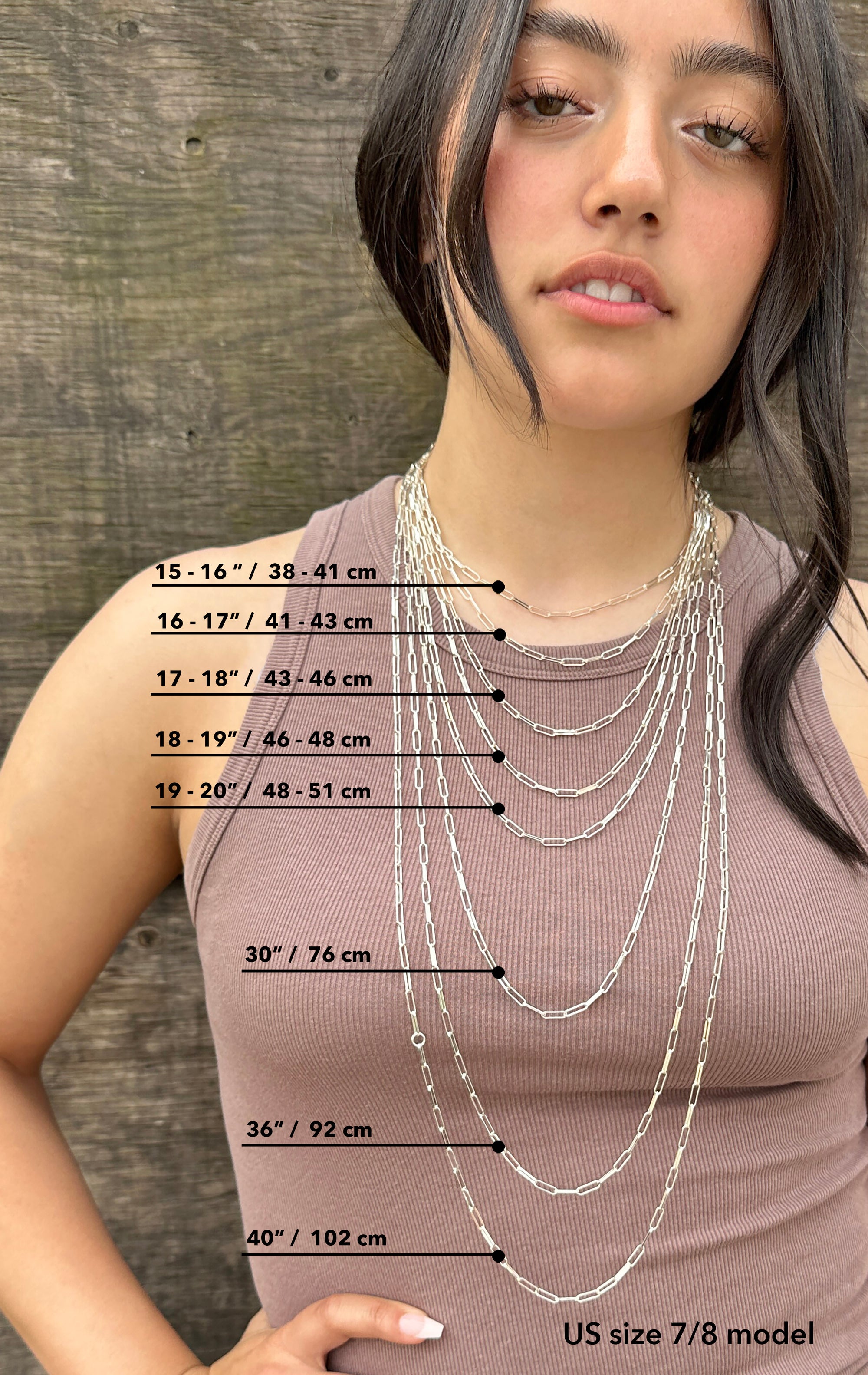 hispanic model wearing various lengths of sterling silver chains, necklace size guide by Sincerely Chain Co. jewelry