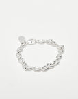 Sterling Silver bracelet with puffed anchor chain links on a light gray background