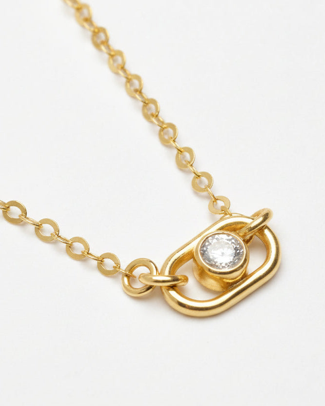 detailed look at a lab grown diamond set in sterling silver with a dainty silver chain necklace