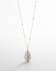 Baroque Pearl and 14k gold Satellite Chain necklace on a white background