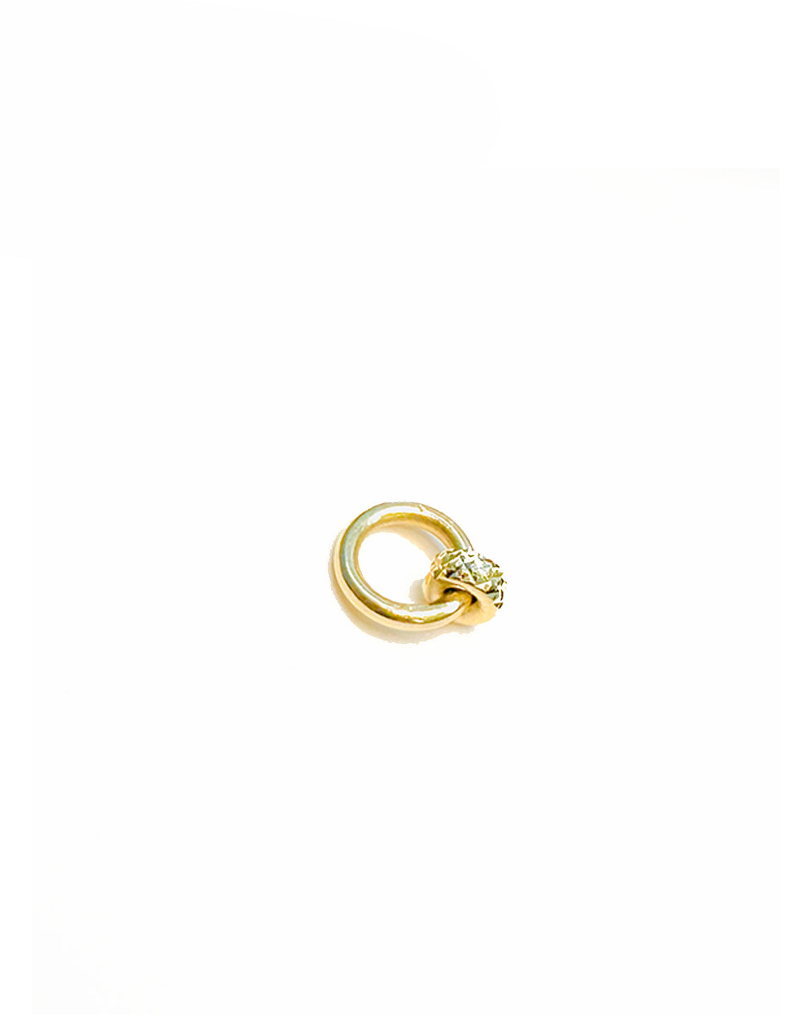 A 14K gold Roundel Charm with a pyramid-cut patterned bead, modern minimalist jewelry by Sincerely Chain Co.