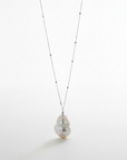 Sterling Silver Baroque Pearl Necklace on a white background, fine jewelry by Sincerely Chain Co.