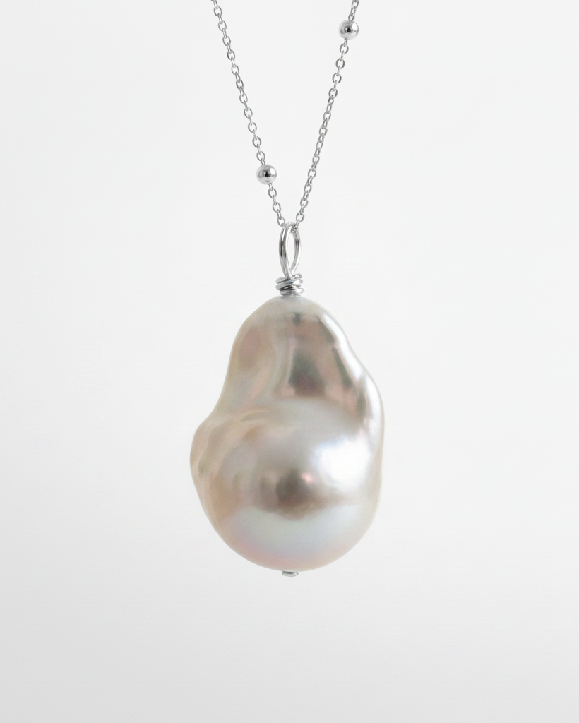Sterling Silver Baroque Pearl necklace on a satellite bead chain.