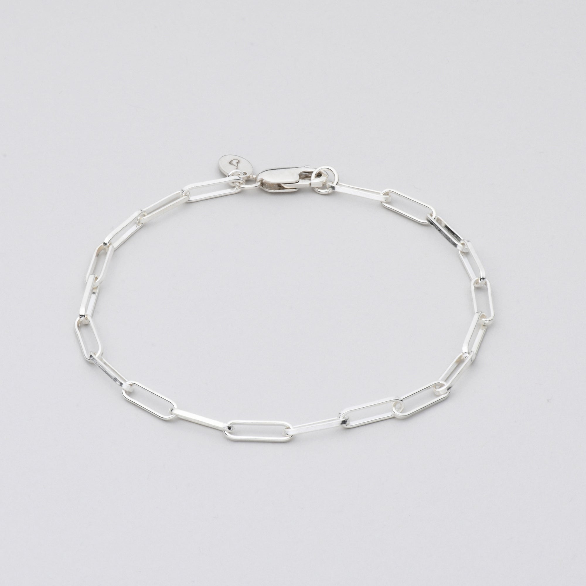 Sterling Silver bracelet on grey background