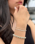 women wearing a three sterling silver bracelet stack