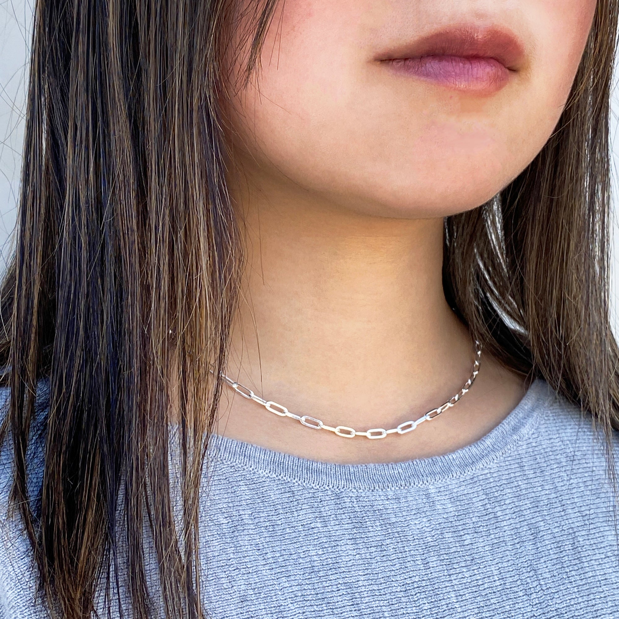 women wearing sparkling sterling silver necklace
