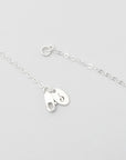 detailed image of a sterling silver necklace clasp with sincerely chain co logo tag